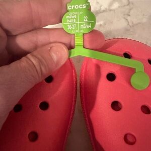 New pink pined crocs